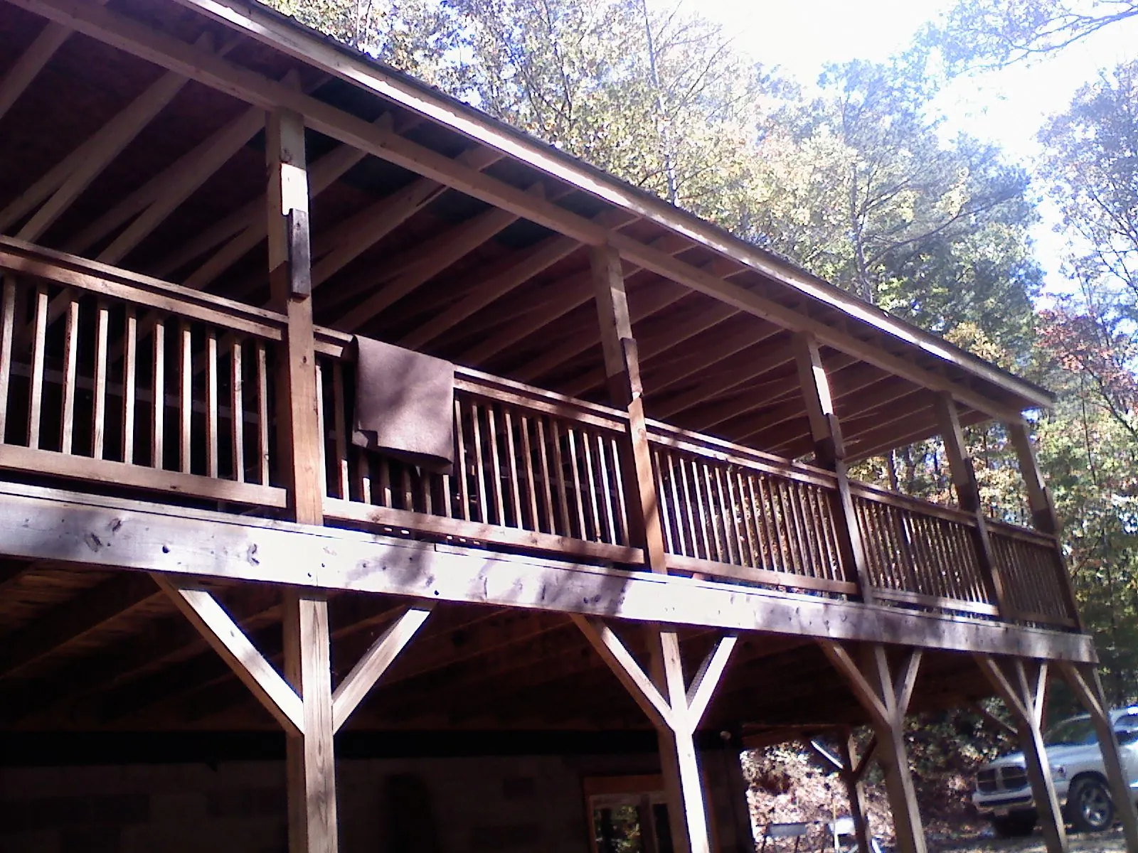 Timber framing under a new elevated porch and deck — Roof Leak Repair in Warren by Roofing Brothers